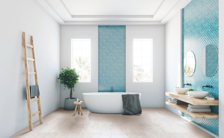 blue accent tile in coastal themed bathroom